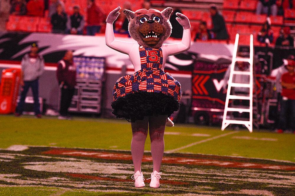 Ms. Wuf greets spectators during the Wolfpack's game against the Virginia Tech Hokies on Thursday, Oct. 27, 2022 at Carter-Finley Stadium. The Wolfpack beat the Hokies 22-21.