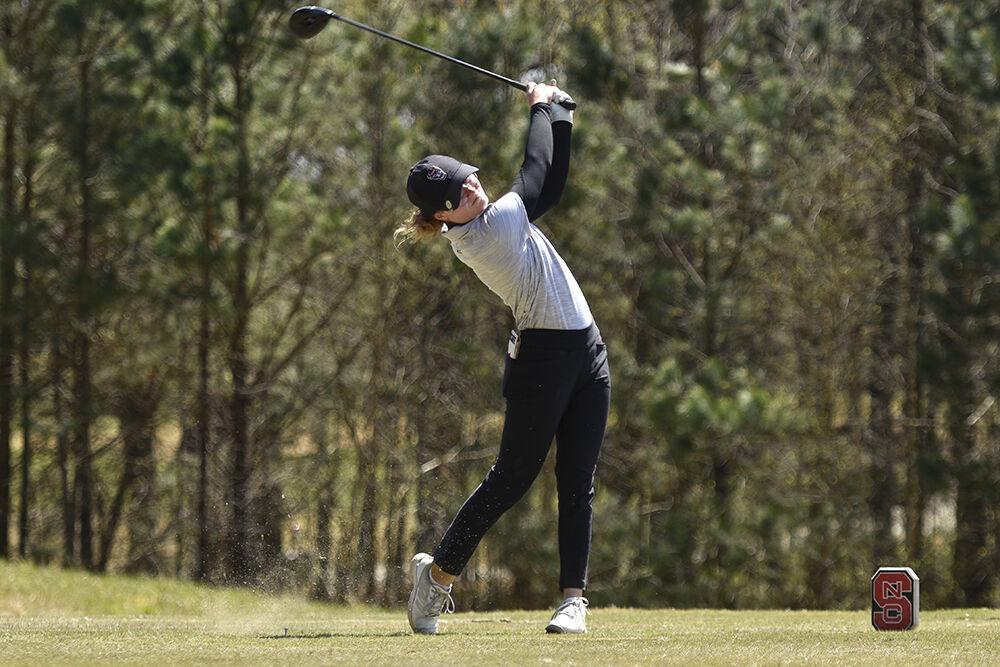 Junior Natalie Armbruester drives the ball at Lonnie Poole Golf Course during the Wolfpack Match Play on Sunday, April 3, 2022. Armbruester picked up a 1Up win against her Florida State opponent in the quarterfinals. NC State came in third place out of the eight teams playing.