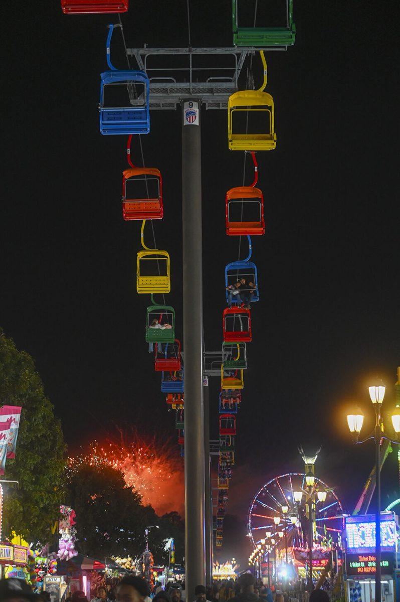 Fair Attendees ride the State Fair Flyer at the North Carolina State Fair in Raleigh, on Thursday, Oct. 13, 2022. The NC State Fair was held Oct. 13-23.