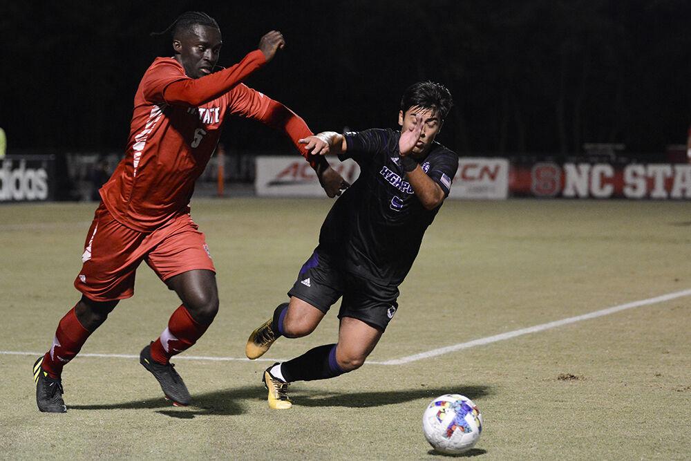 Senior defender Kendall Edwards chases after the ball during the match against High Point University on Tuesday, Oct. 4, 2022 at Dail Soccer Field. Edwards made one assist for the Wolfpack. NC State beat High Point University 2-0.