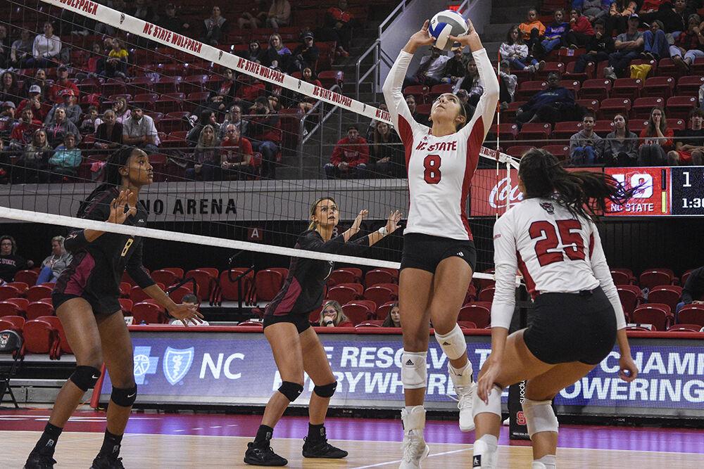 Junior setter Naomi Cabello sets the ball during the game against Florida State on Friday, Sept. 30, 2022 in Reynolds Coliseum. Cabello had 17 assists throughout the game. NC State won the game 3-0.