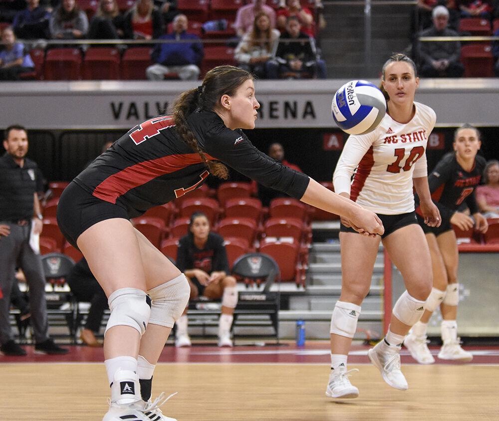Sophomore outside hitter Martyna Leoniak reaches to make a pass in the game against the Miami Hurricanes on Sunday, Oct. 2, 2022 in Reynolds Coliseum. Leoniak made eight digs throughout the game. The Wolfpack won 3-1.