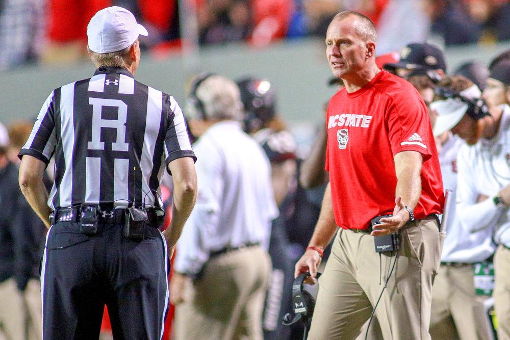 Head coach Dave Doeren questions the referees during the 27-23 loss to Wake Forest on Thursday, Nov. 8 in Carter-Finley Stadium.