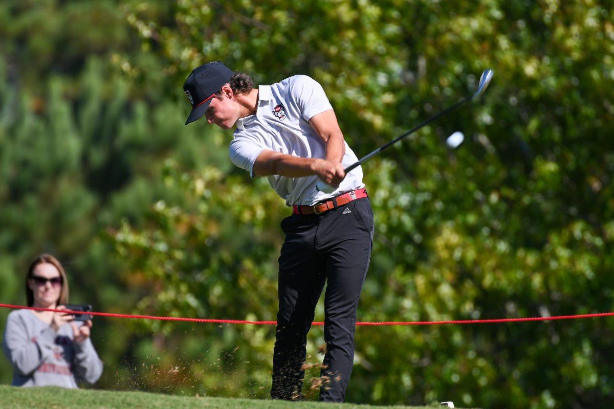 Freshman Joey Lenane tees off during the Wolfpack Intercollegiate tournament on Saturday, Oct. 15, 2022. Lenane had a score of 6-over. NC State tied for second place.
