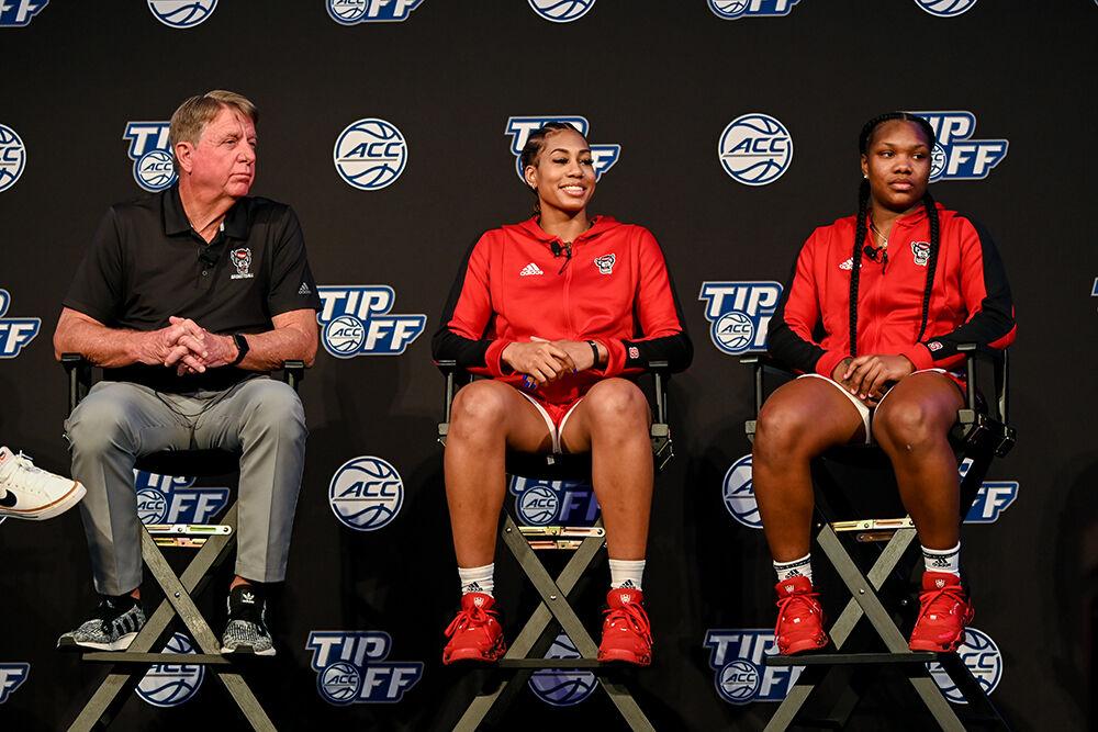 Head coach Wes Moore, left, senior wing Jakia Brown-Turner, center, and junior guard Diamond Johnson, right, accept a question from the media during the ACC Tipoff on Tuesday, Oct. 11, 2022 at The Westin Charlotte in Charlotte, North Carolina. The ACC Tipoff is an event that spans two days to promote the upcoming women and men's basketball seasons.&#160;Brown-Turner and Johnson spoke about the future of the NC State women's basketball team and how they plan to lead the team this season.