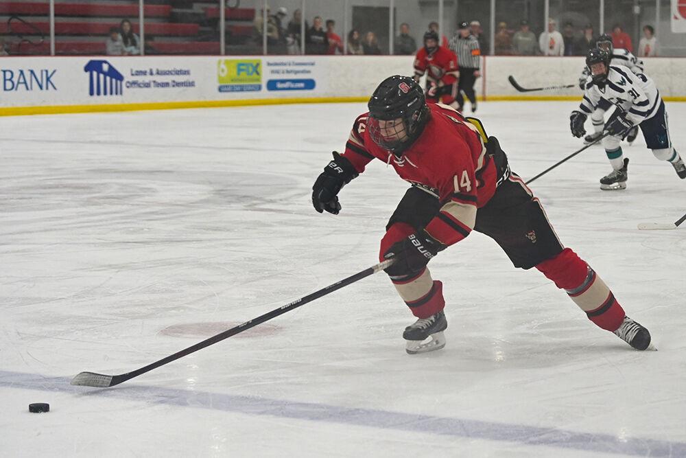 Junior forward Drew Bresingham chases the puck during the game against UNC-Wilmington at Wake Competition Center on Friday, Oct. 14, 2022. Icepack won 4-1.