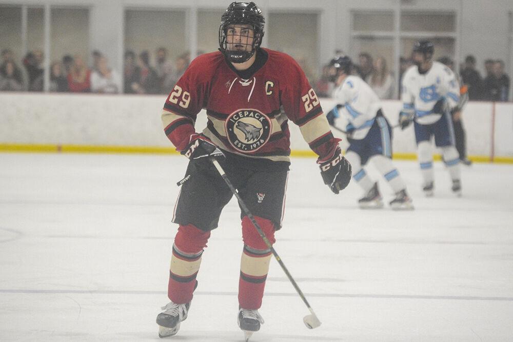 Senior defenseman Victor Hugo skates up the ice during the NC State versus UNC-Chapel Hill game at Wake Competition Center on Friday, Sept. 30, 2022. NC State lost 5-3.