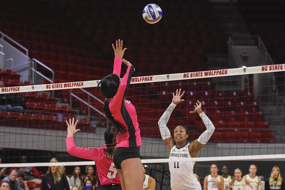 Sophomore middle blocker Jada Allen blocks in the game against Georgia Tech on Sunday, Oct. 30, 2022 in Reynolds Coliseum. Allen recorded five kills, two assists and eight points. The Wolfpack lost to the Yellow Jackets 1-3.