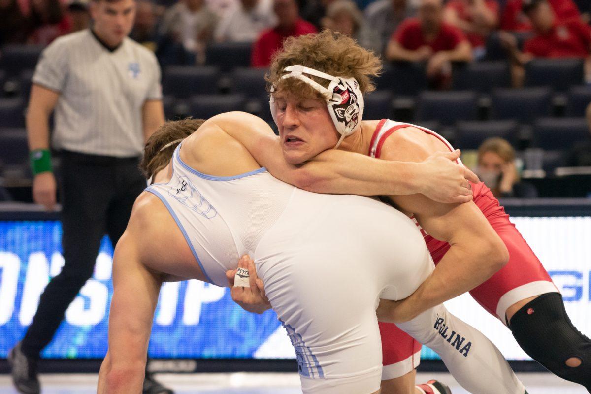 Redshirt sophomore Trent Hidlay takes down his opponent during the 2022 ACC Championships at John Paul Jones Arena in Charlottesville, Virginia on March 6, 2022. NC State won its fourth straight ACC Championship, and Hidlay won his second straight individual championship.