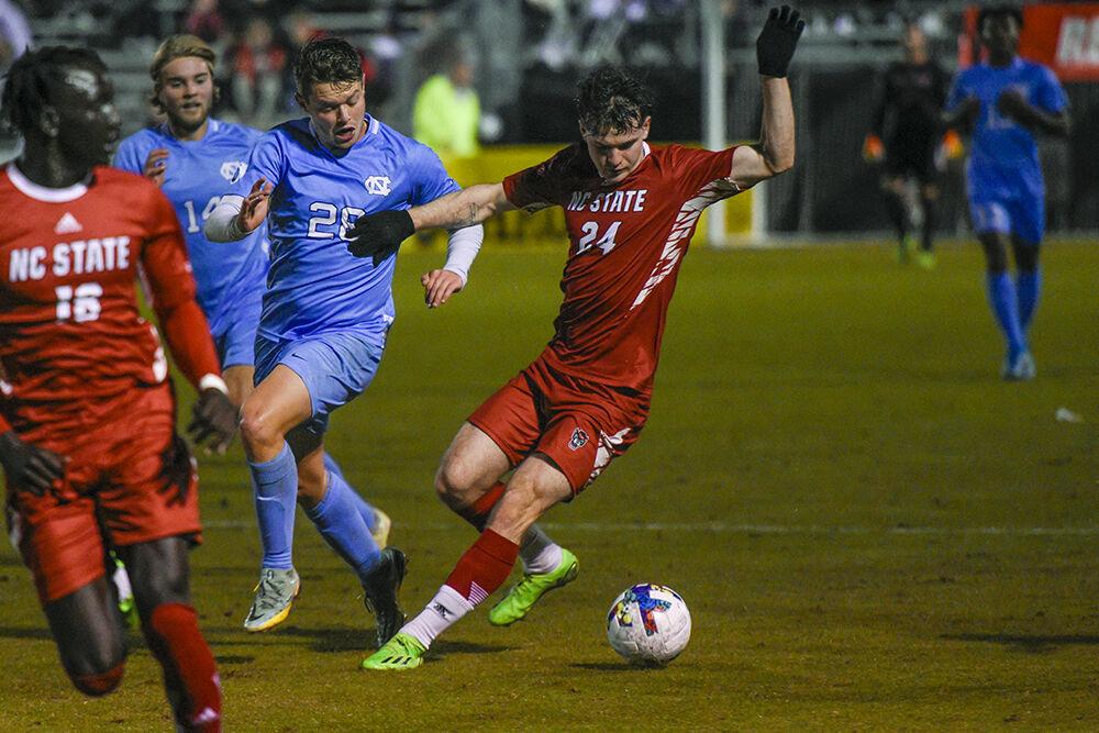 Senior defender Cam Murray defends the ball during the match against UNC-Chapel Hill on Friday,&#160;Oct. 14, 2022 at Dail Soccer Field. NC State tied 2-2 with&#160;UNC-Chapel Hill.