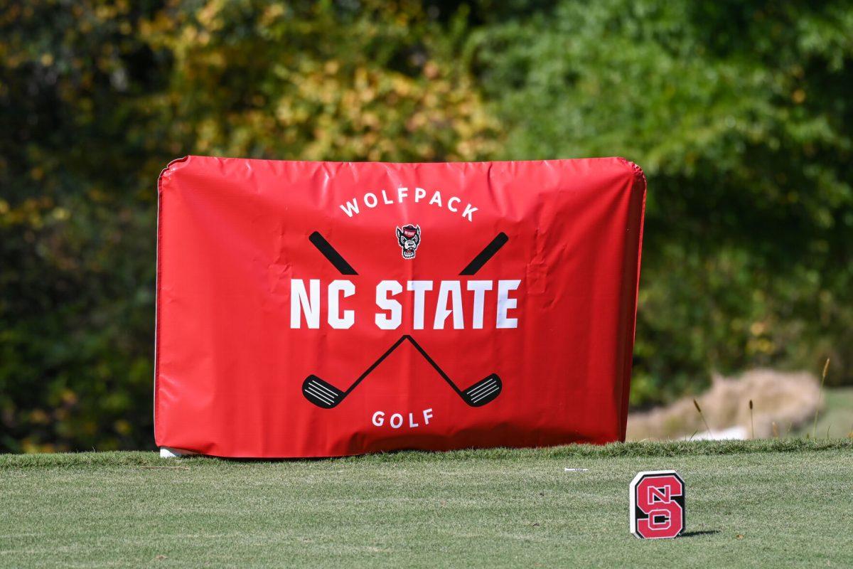 NC State Golf banner sits on Lonnie Poole Golf Course during the Wolfpack Intercollegiate tournament on Saturday, Oct. 15, 2022. NC State tied for second place.