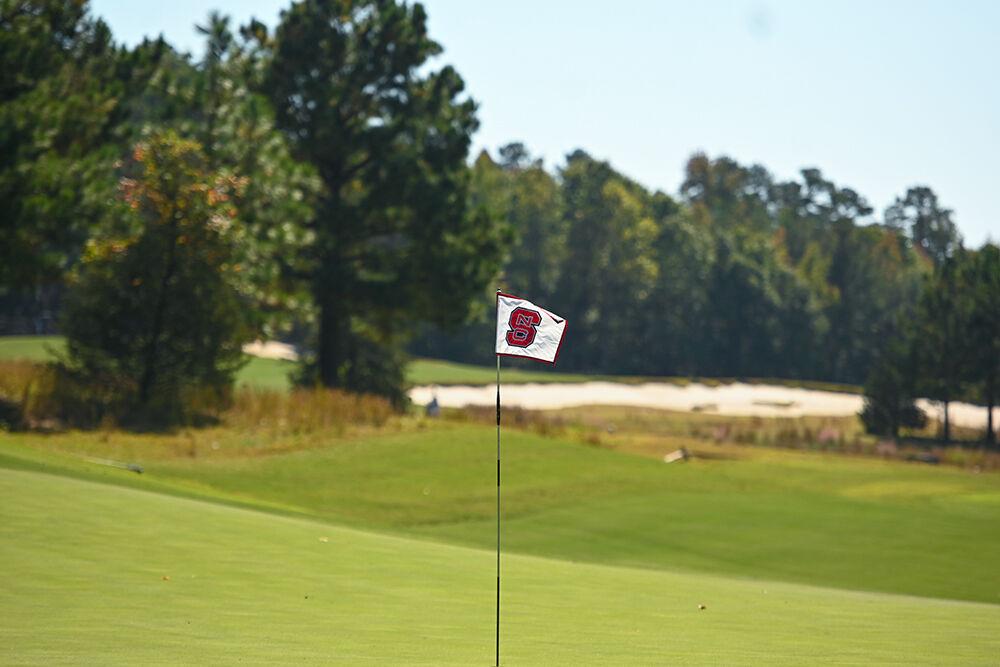 Hole 10's flag flaps in the wind during the Wolfpack Intercollegiate at the Lonnie Poole Golf Course on Saturday, Oct. 15, 2022. NC State tied for second.