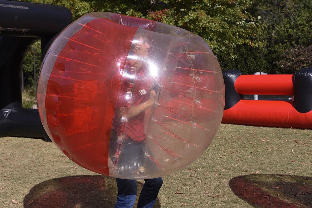 Nick Mruk, a fourth-year student studying political science and Spanish, plays bubble soccer at the Red and White Week Kickoff on Monday, Oct. 31, 2022 at Stafford Commons. The Red and White Week Kickoff was an event with free t-shirts and many fun activities to celebrate the beginning of homecoming week.