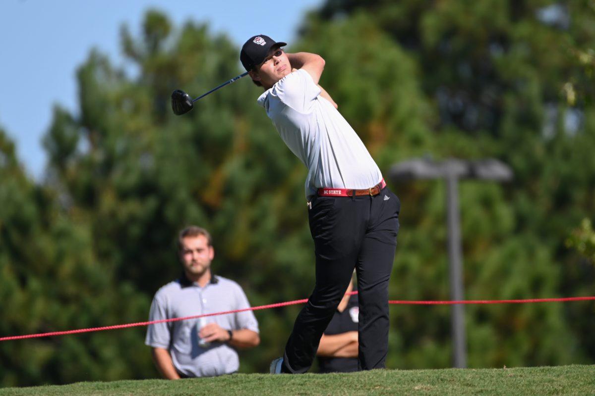Senior Brandon Einstein drives the ball during the Wolfpack Intercollegiate at Lonnie Poole Golf Course on Saturday, Oct. 15, 2022. Einstein tied for 28th with a score of 5-over. NC State tied for second place.