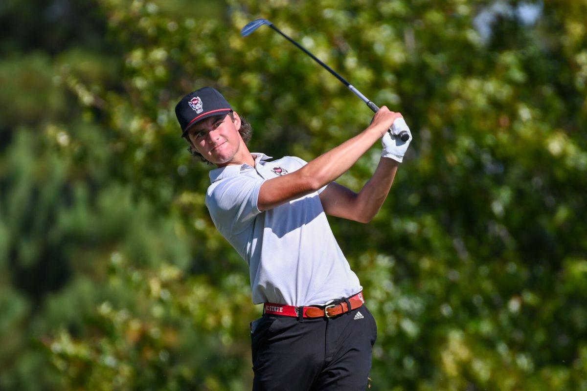Freshman Joey Lenane tees off during the Wolfpack Intercollegiate tournament on Saturday, Oct. 15, 2022. Lenane had a score of 6-over. NC State tied for second place.