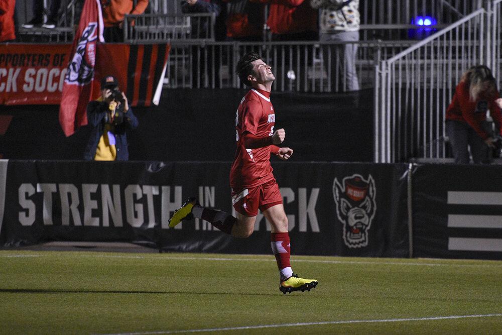 Graduate midfielder Conor Kelly celebrates after scoring during the Wolfpack's home soccer match against the William &amp; Mary Tribe on Tuesday, Oct. 18 2022 at Dail Soccer Field. The Wolfpack beat the Tribe 2-1.