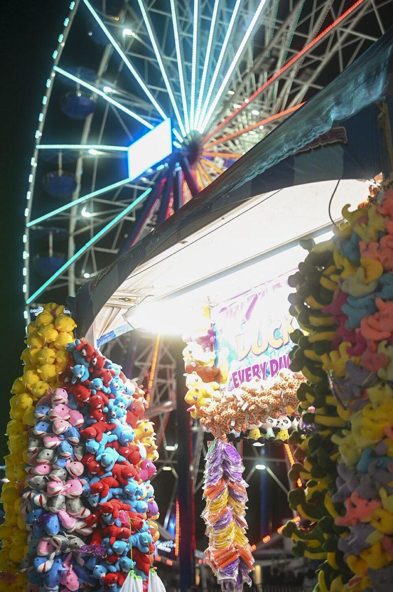Fair Attendees ride a Ferris Wheel at the North Carolina State Fair in Raleigh, on Thursday, Oct. 13, 2022. The NC State Fair was held Oct. 13-23.