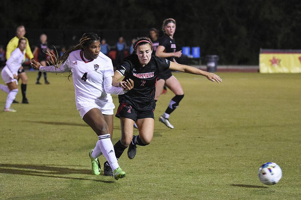 Forward senior Leyah Hall-Robinson passes the ball during the match against Louisville on Thursday, Oct. 20, 2022 at Dail Soccer Field. Hall-Robinson made two shots for the Wolfpack. NC State lost 1-0 to Louisville.