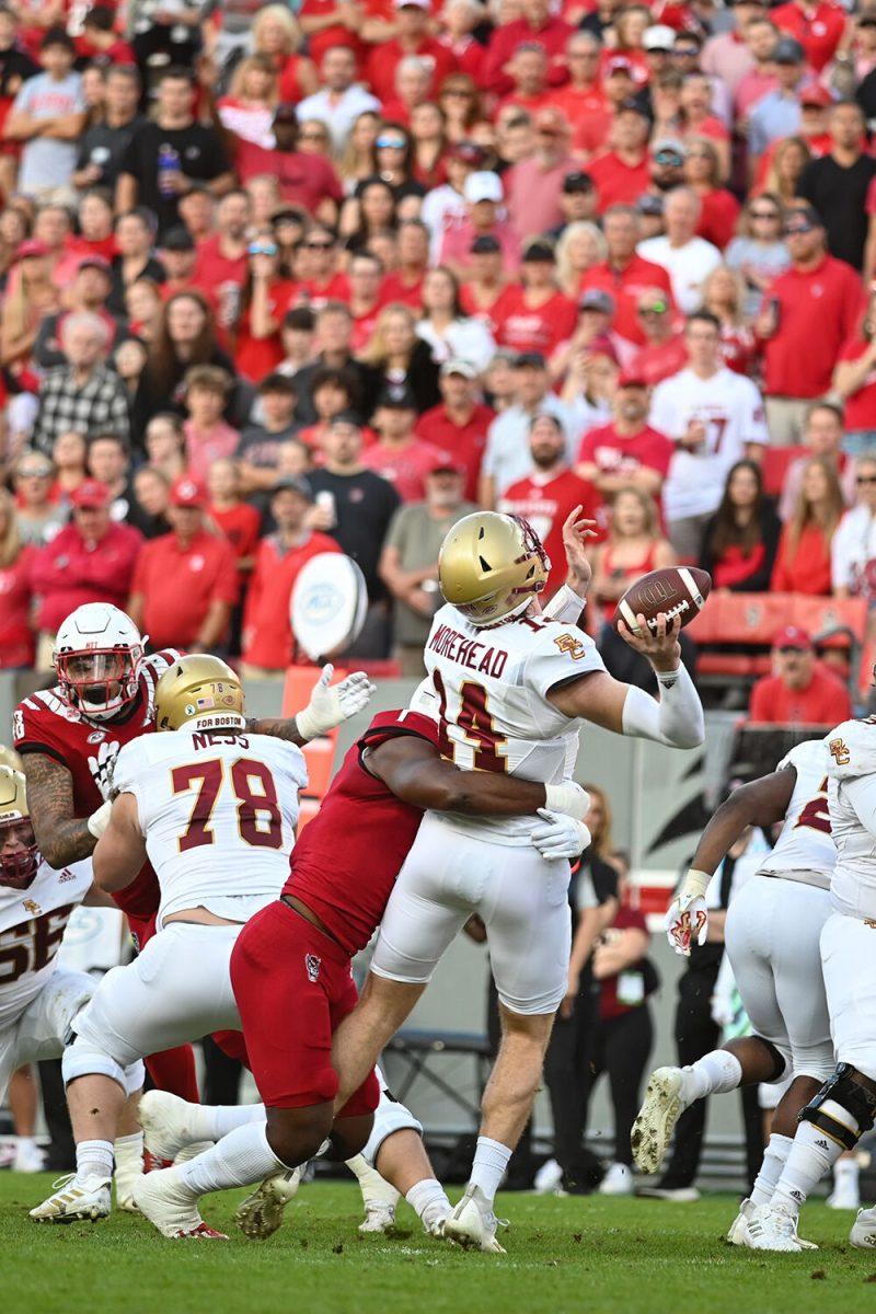 Redshirt graduate linebacker Isaiah Moore sacks the Boston College quarterback on Saturday, Nov. 12, 2022 in Carter-Finley Stadium. Moore had five tackles and one sack in the game. NC State lost to Boston College 21-20.