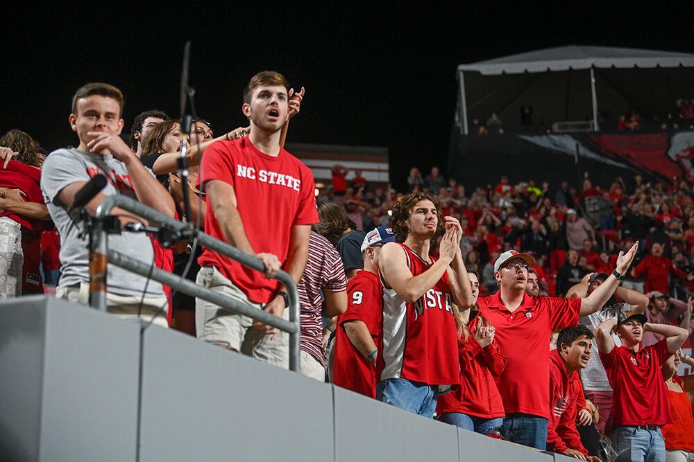 NC State football fans react to a penalty late in the game on Saturday, Nov. 12, 2022 at Carter-Finley Stadium. NC State lost to Boston College 21-20.