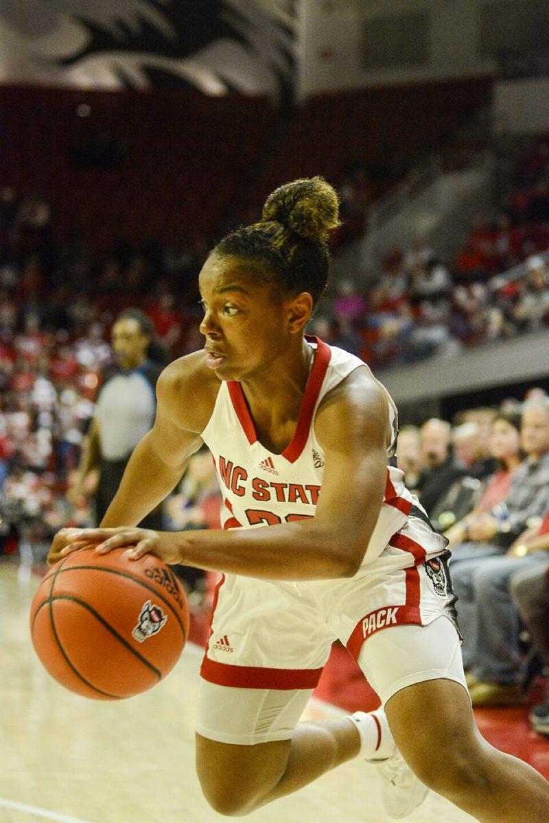 Sophomore guard Jessica Timmons dribbles toward the basket during the game against Elon at Reynolds Coliseum on Thursday, Nov. 10, 2022. Timmons scored seven points for the Wolfpack on 100% shooting. NC State beat Elon 89-55.
