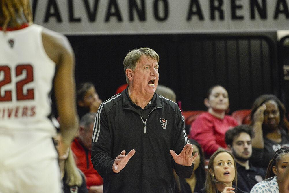 Head coach Wes Moore instructs his team during the game against Elon at Reynolds Coliseum on Thursday, Nov. 10, 2022. NC State beat Elon 89-55.