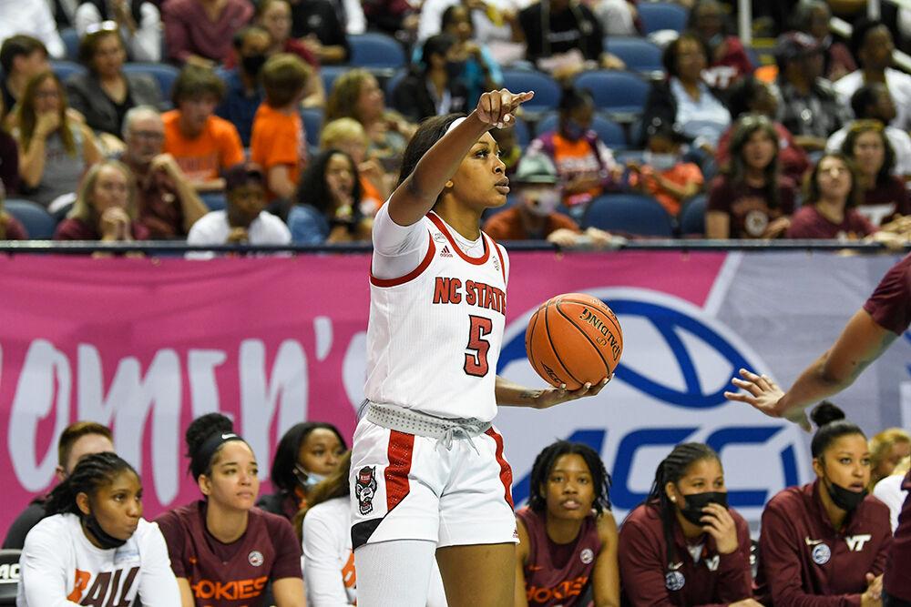 Junior forward Jada Boyd signals a teammate in the game against Virginia Tech on Saturday, March 5, 2022 inside Greensboro Coliseum. Boyd made seven field goals and four rebounds during the game. NC State won 70-55.
