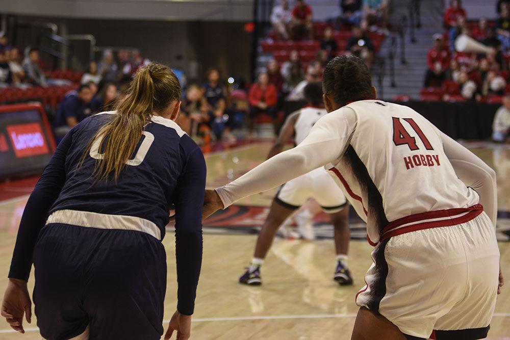 Senior center Camille Hobby guards a Mount St. Mary's player during the game against Mount St. Mary's at Reynolds Coliseum on Sunday, Nov. 13, 2022. Hobby got one rebound during the game. NC State beat Mount St. Mary's 86-38.