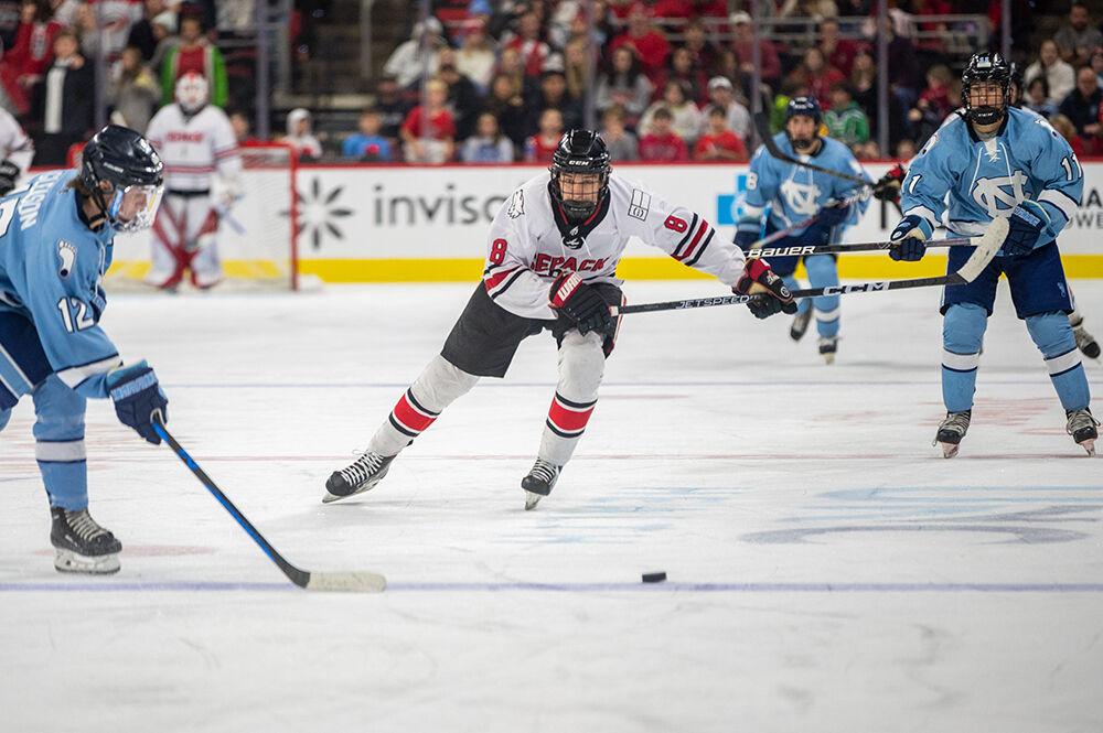 Freshman right wing Zack Herman attempts to steal the puck during the Governor's Cup game against the UNC Tar Heels on Monday, Nov. 21, 2022&#160;in PNC Arena. The Icepack lost to the Tar Heels 4-2.