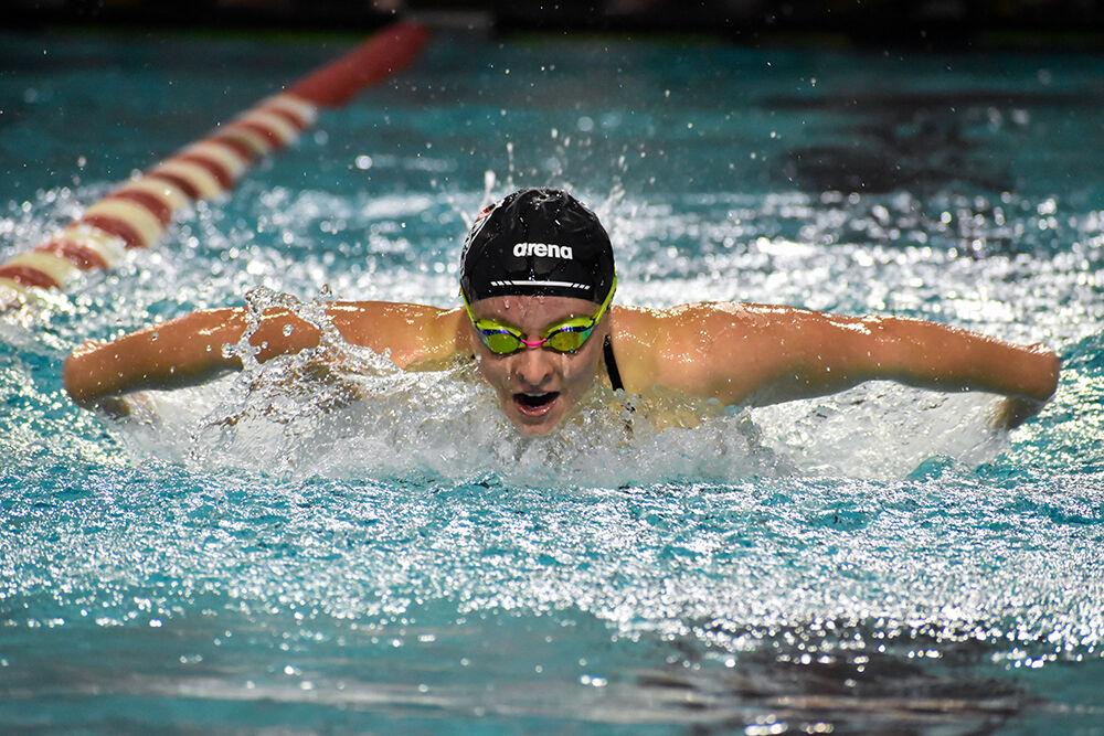 Sophomore Grace Sheble competes in the women's 200-yard butterfly against the Kentucky Wildcats on Friday, Oct. 21, 2022 at Willis R. Casey Aquatic Center. Sheble finished with a time of 1:58.56. The Wolfpack women beat the Kentucky Wildcats 172-126.