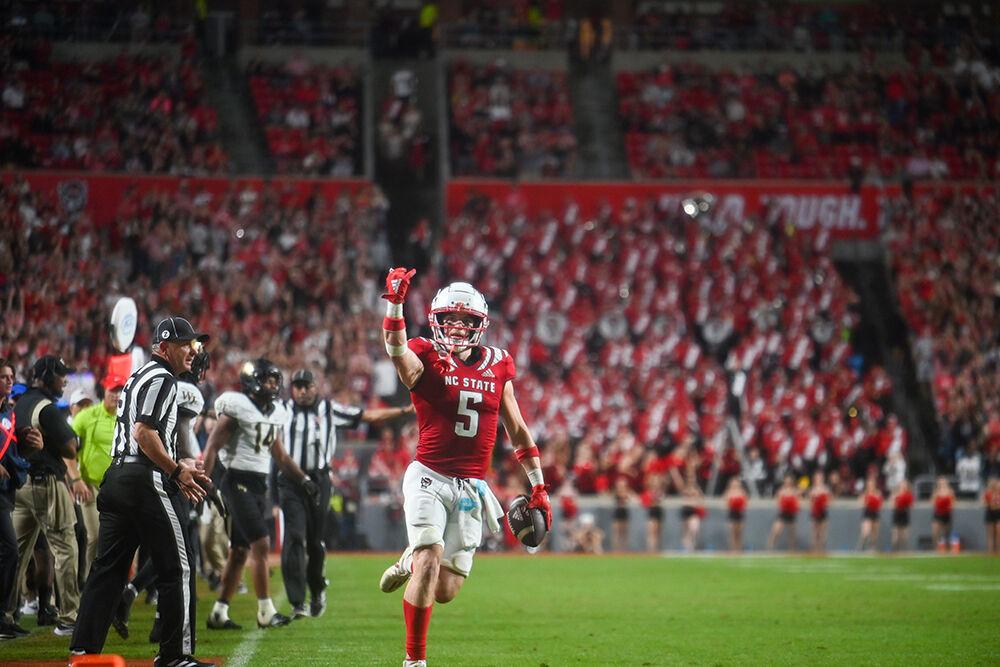 Graduate wide receiver Thayer Thomas celebrates after gaining a first down in the game over Wake Forest on Saturday, Nov. 5, 2022 at Carter-Finley Stadium. Thomas had eight receptions for 79 yards during the game.&#160;NC State defeated Wake Forest 30-21.