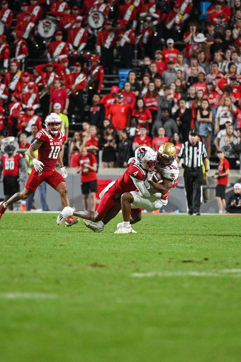 Redshirt graduate safety Cyrus Fagan tackles a Boston College receiver on Saturday, Nov. 12, 2022 at Carter-Finley Stadium. Fagan had eight tackles and one tackle for loss in the game. NC State lost to Boston College 21-20.