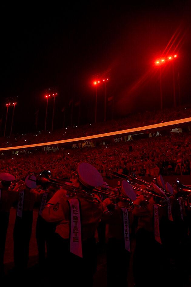 The NC State Marching Band plays while Carter-Finley Stadium is lit red on Saturday, Nov. 5, 2022 at Carter-Finley Stadium. NC State defeated Wake Forest 30-21.