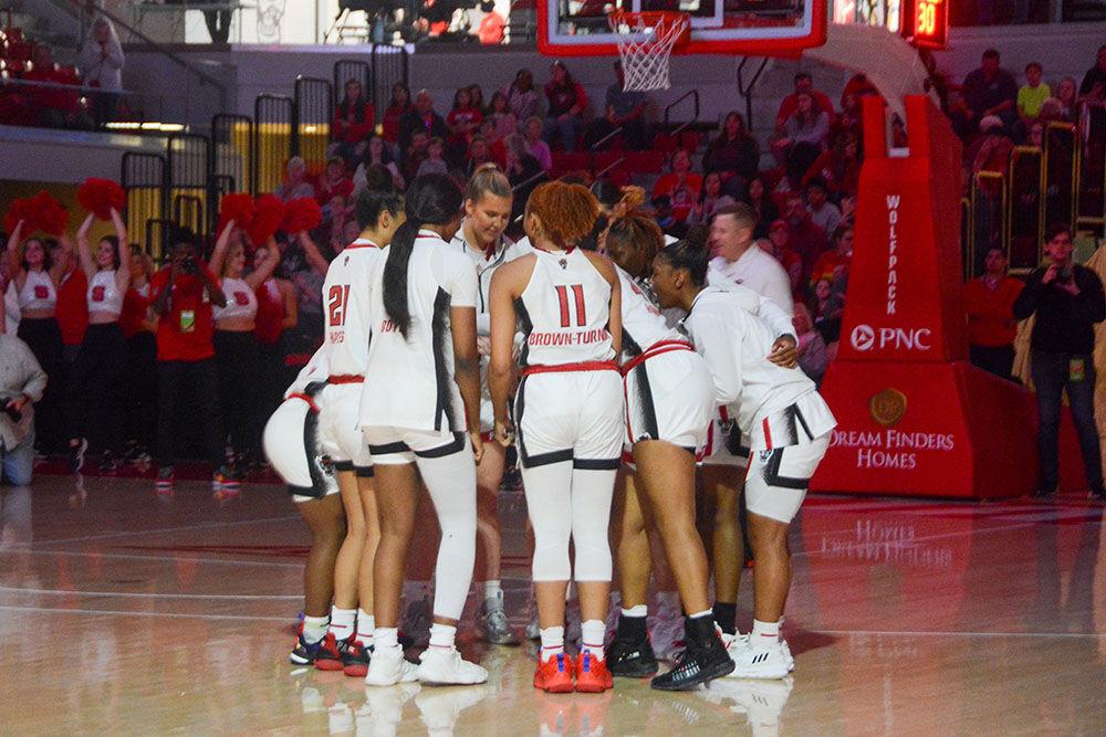 The NC State women's basketball team gathers together before their game againts Mount St. Mary's on Sunday, Nov. 13, 2022 in Reynolds Coliseum. NC State beat Mount St. Mary's 86-38.