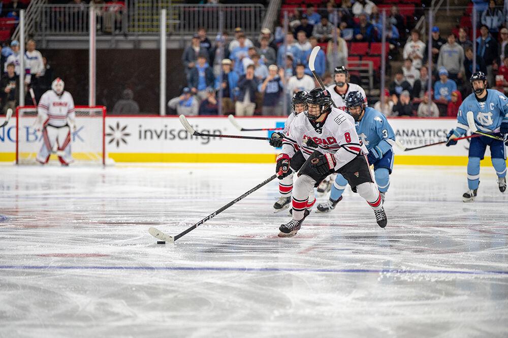 Freshman right wing Zack Herman moves the puck down the ice during the Governor's Cup game against the UNC Tar Heels on Monday, Nov. 21, 2022&#160;in PNC Arena. The Icepack lost to the Tar Heels 4-2.