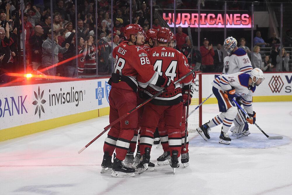 The team celebrates a goal during the Hurricanes' home game against the Edmonton Oilers on Thursday, Nov. 10, 2022 in PNC Arena. The Canes beat the Oilers 7-2.