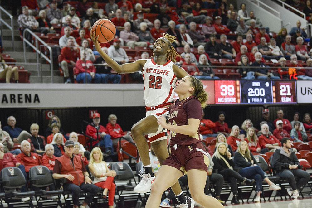Sophomore guard Saniya Rivers drives to the basket during the game against Elon at Reynolds Coliseum on Thursday, Nov. 10, 2022. Rivers led the Wolfpack in rebounds with seven. NC State beat Elon 89-55.