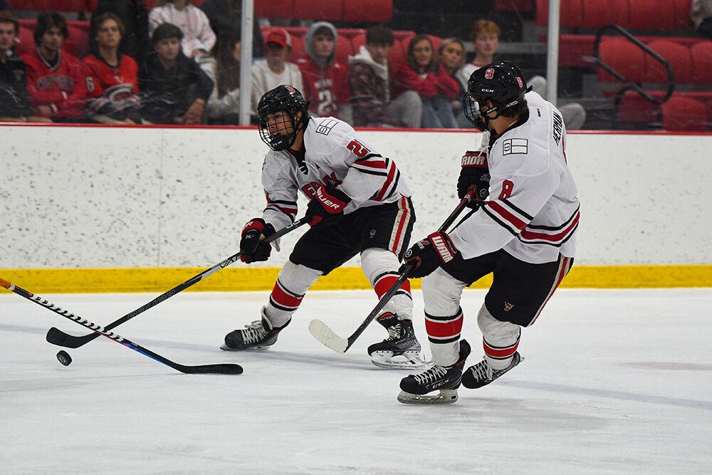 Icepack senior forward Alex Robinson dekes the puck during the game against University of Mary on Thursday, Oct. 13, 2022 at Wake Competition Center. The Icepack lost to the Maurauders 4-0.