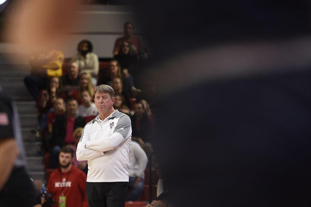 NC State head coach Wes Moore observes the performance of his team in the fourth quarter at the game versus Mount St. Mary's at Reynolds Coliseum on Sunday, Nov. 13 2022. NC State beat Mount St. Mary's 86-38.