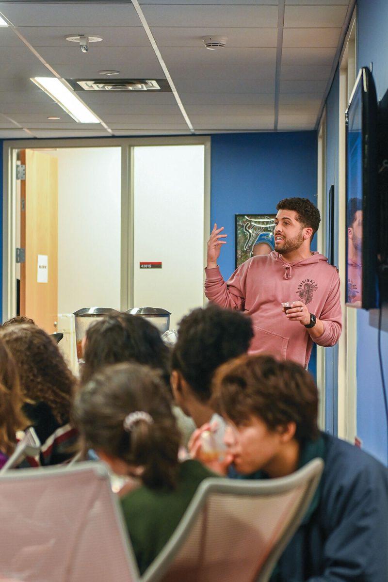 Gavin Bell, Assistant Director of Multicultural Student Affairs, talks to students at the Native American Heritage Month Chat n Chew discussion on Wednesday, Now. 9, 2022 in Talley Student Union. The Chat n Chew, organized by the Multicultural Student Affairs, provided attendees with dinner and an opportunity to discuss some of the issues regarding Native Americans on campus and beyond.