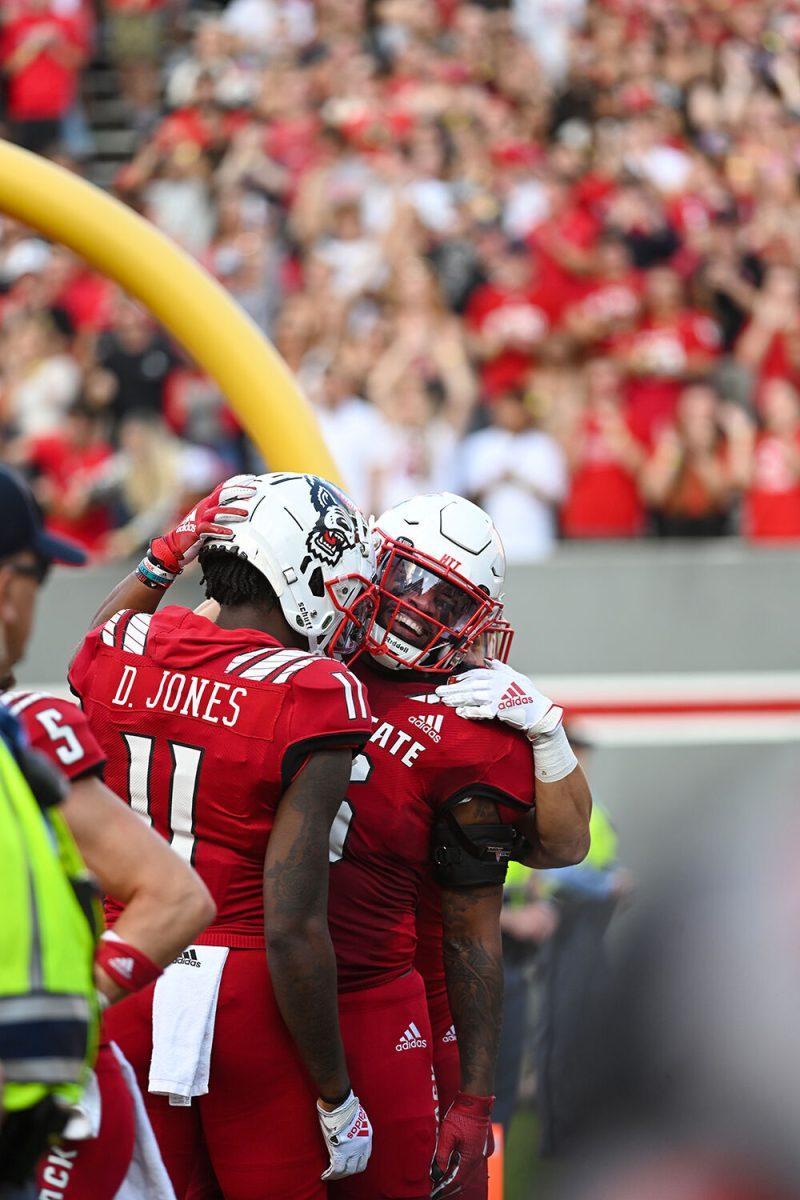 Redshirt junior tight end Trent Pennix celebrates after scoring a touchdown during the game on Saturday, Nov. 12, 2022 at Carter-Finley Stadium. Pennix had 53 receiving yards and a touchdown. NC State lost to Boston College 21-20.