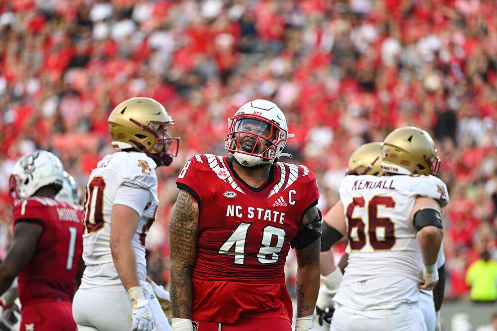 Redshirt graduate defensive lineman Corey Durden celebrates after tackling a Boston College player during the game on Saturday, Nov. 12, 2022 in Carter-Finley Stadium. NC State lost to Boston College 21-20.