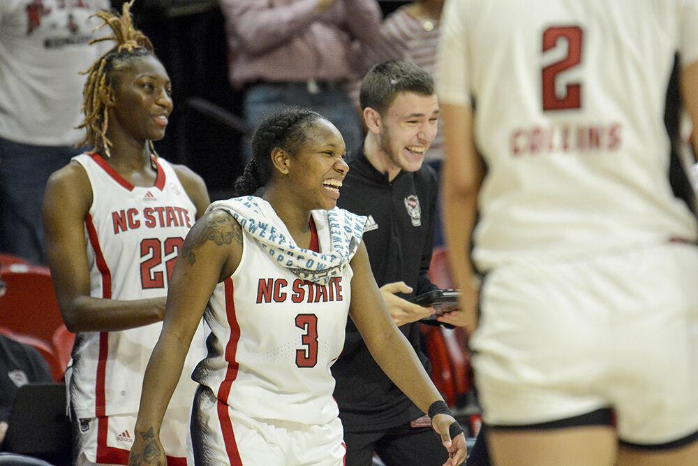 Junior guard Diamond Johnson smiles after the game against Elon at Reynolds Coliseum on Thursday, Nov. 10, 2022. Johnson led the team in scoring with 18 points on 63.6% shooting. NC State beat Elon 89-55.