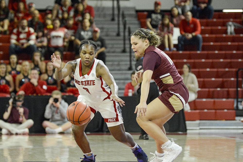 Junior guard Diamond Johnson steals the ball during the game against Elon in Reynolds Coliseum on Thursday, Nov. 10, 2022. Johnson led the team in scoring with 18 points on 63.6% shooting. NC State beat Elon 89-55.