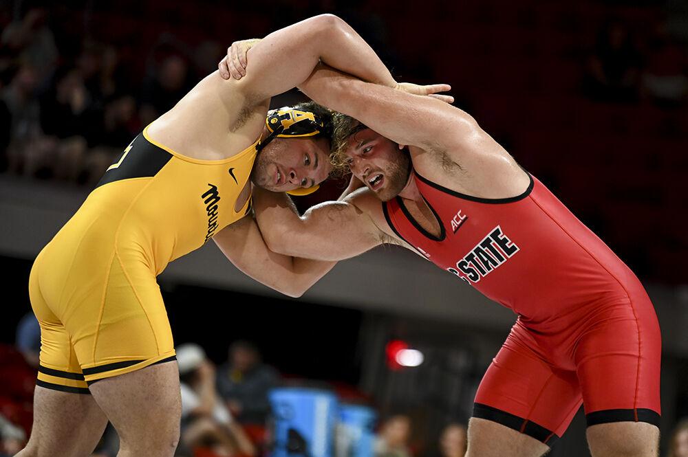 Redshirt sophomore Owen Trephan grapples his opponent during the 285 bout of the NC State duel against App State on Friday, Nov. 4, 2022 in Reynolds Coliseum. Trephan won his individual match by decision 8-3. The Wolfpack beat the Mountaineers 26-12.