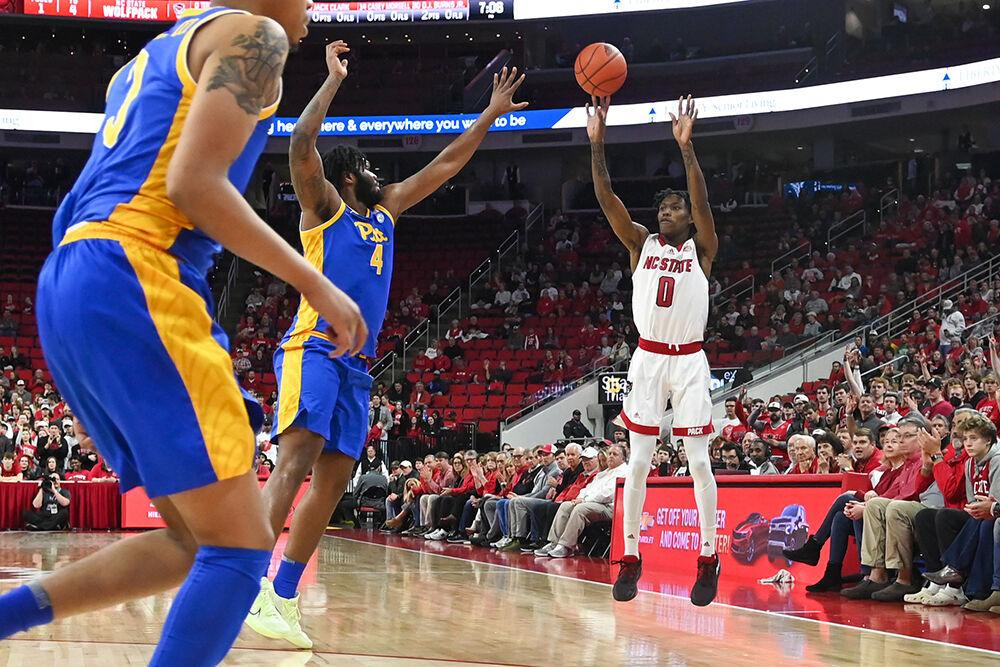 Sophomore guard Terquavion Smith shoots the ball during the game against Pitt inside PNC Arena on Friday, Dec. 2, 2022. Smith had six rebounds, four assists, and two steals, alongside the 15 points he scored for the Wolfpack. NC State lost the game to Pitt 68-60.