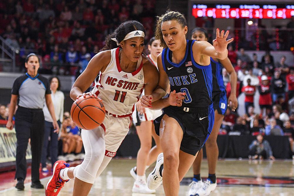 Senior wing Jakia Brown-Turner presses forward to the basket in the game against Duke in Reynolds Coliseum on Thursday, Dec. 29, 2022. Brown-Turner made five rebounds and two steals, while also scoring 12 points for the Wolfpack. NC State lost the game to Duke 72-58.