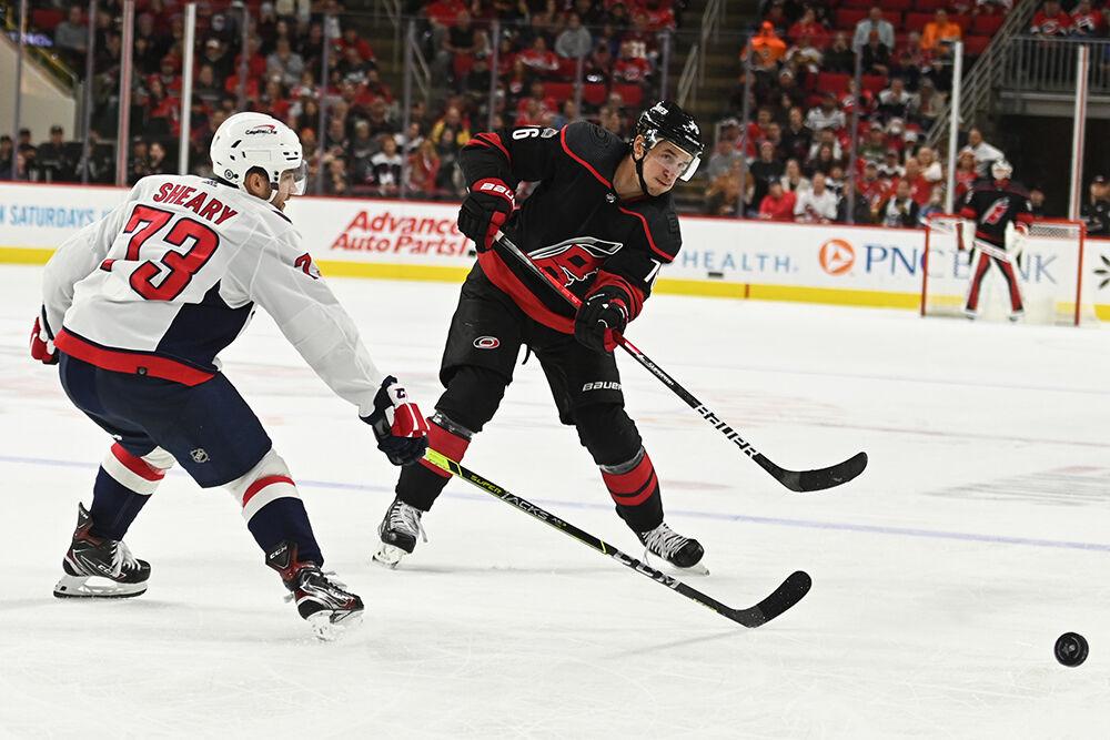 Carolina Hurricanes defenseman Brady Skjei passes the puck during the game against the Washington Capitals on Monday, Oct. 31, 2022 in PNC Arena. The Hurricanes beat the Capitals 3-2.