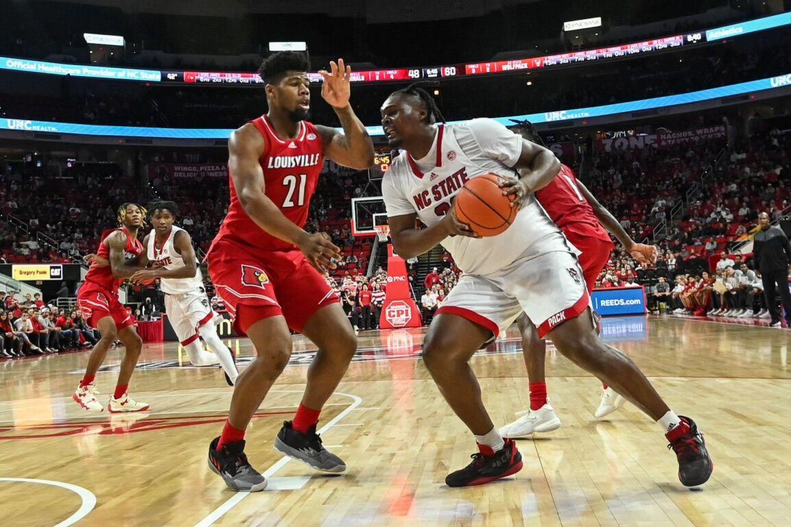 Graduate forward D.J. Burns Jr. evades defense at PNC Arena on Thursday, Dec. 22, 2022.