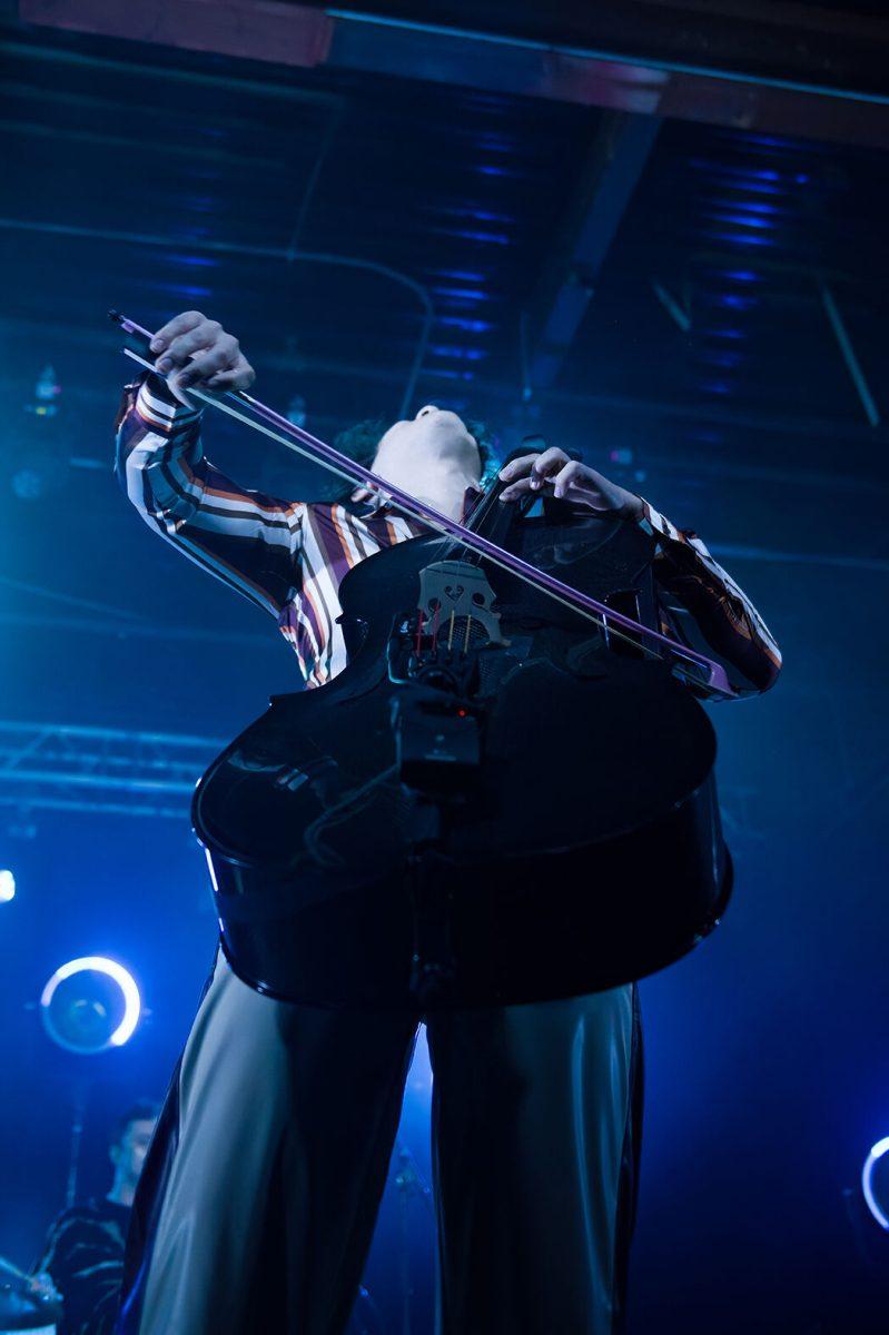 Calvin Langman of The Happy Fits plays chello during their concert at Cats Cradle on Tuesday Dec. 13, 2022. The Happy Fits recently garnered a larger audience after the release of their most recent album "Under the Shades of Grey."